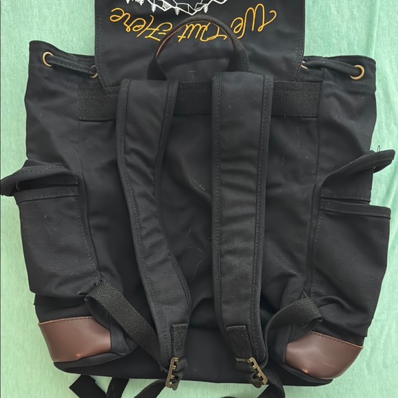 Stylish Black and Brown Backpack with Graphic Design - Picture 6 of 6